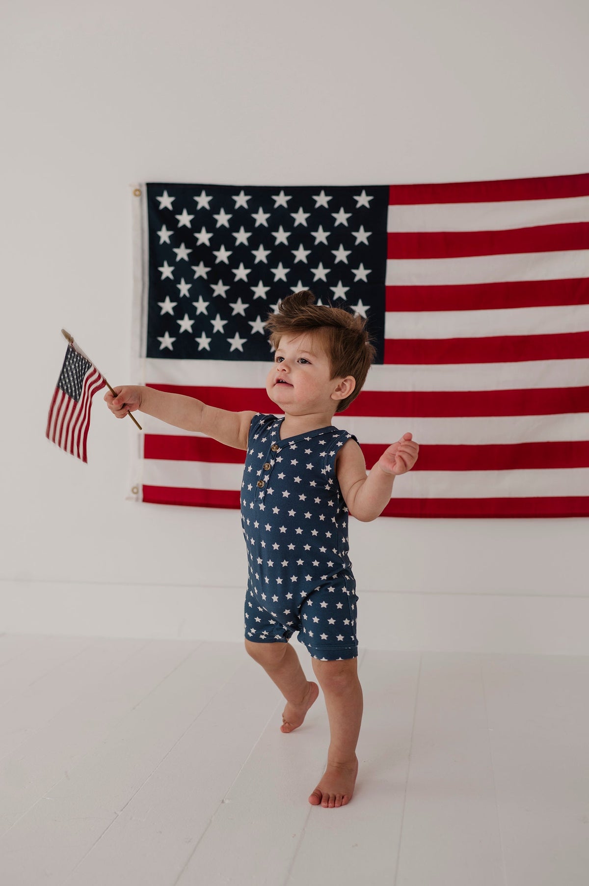 BABYSPROUTS: SLEEVELESS ROMPER - NAVY AMERICAN STARS