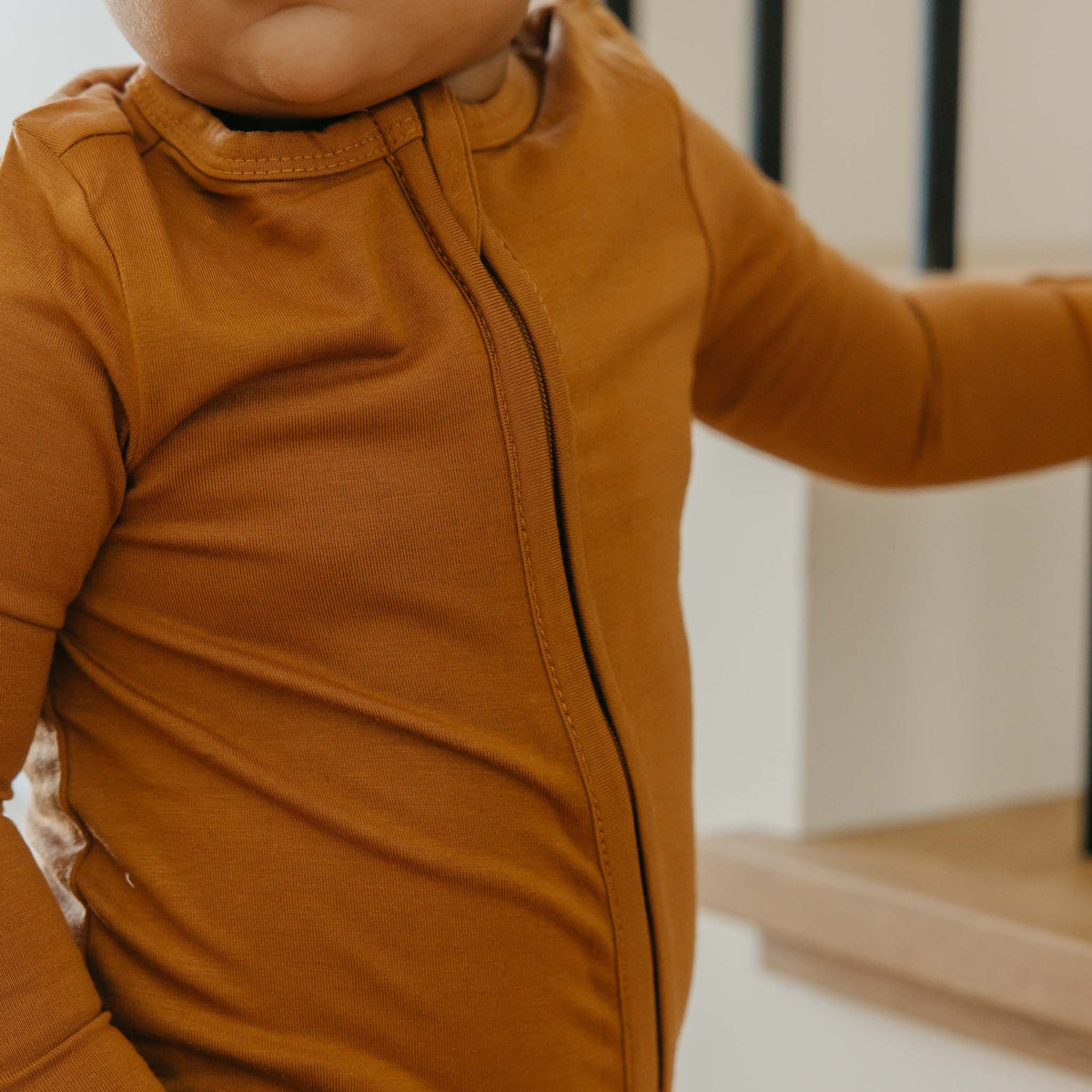 COPPER PEARL: CAMEL ZIP-UP FOOTIE PAJAMA