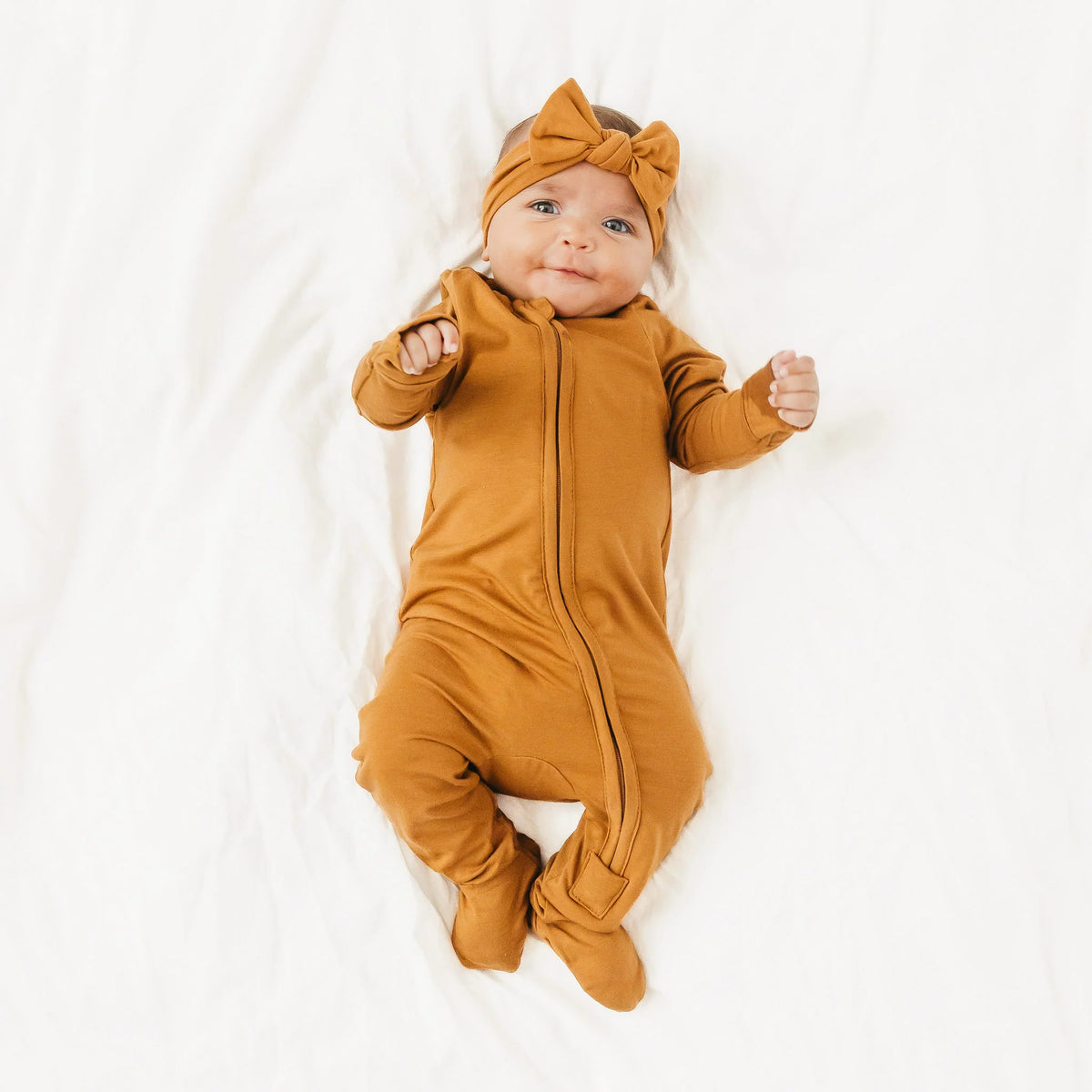 COPPER PEARL: CAMEL ZIP-UP FOOTIE PAJAMA