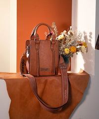 WRANGLER: LEATHER TASSELS CROSSBODY BAG - BROWN