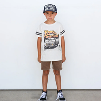 TINY WHALES: KEEP ON TRUCKIN' FOOTBALL TEE - PARCHMENT/VINTAGE BLACK