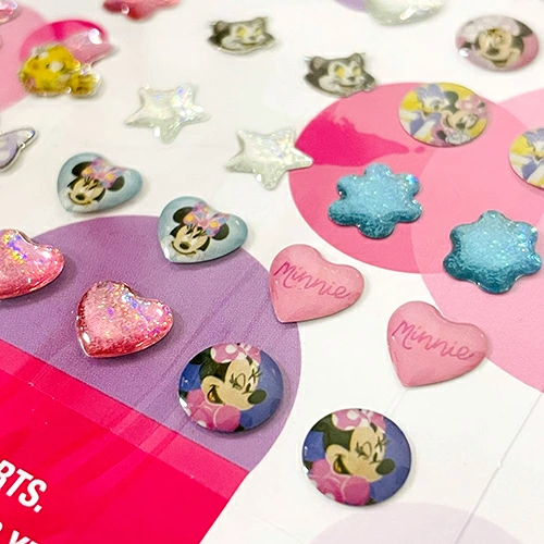 DISNEY: MINNIE BOWTIQUE 24 PAIR STICKER EARRINGS (48-PIECES)