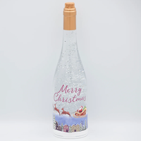 CONFETTI LITES LIGHTED SWIRL WINE BOTTLE WITH SANTA FLYING OVER TOWN
