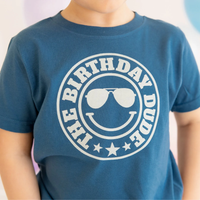 SWEET WINK: THE BIRTHDAY DUDE SHORT SLEEVE T-SHIRT - INDIGO