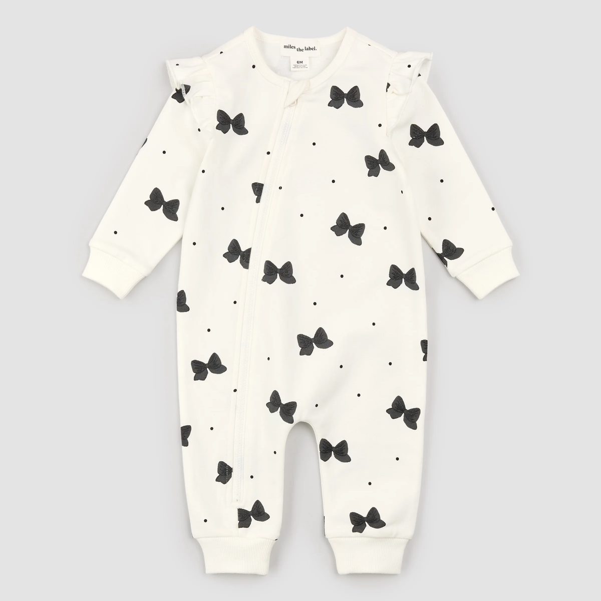 MILES THE LABEL: GLITTER BOW PRINT ON OFF-WHITE PLAYSUIT