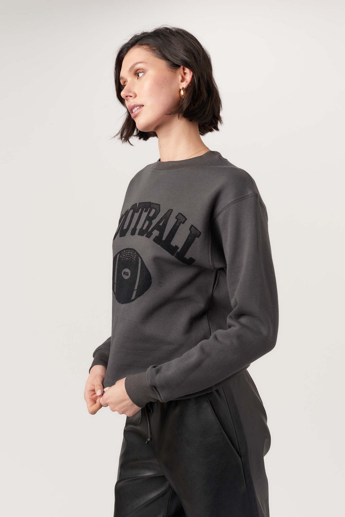 PROJECT SOCIAL T: FLOCKED FOOTBALL SWEATSHIRT - WASHED BLACK