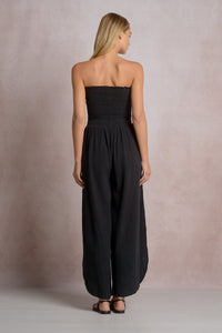 ELAN: SMOCKED STRAPLESS SIDE SLIT JUMPSUIT - BLACK