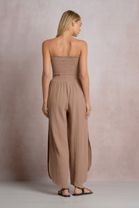 ELAN: SMOCKED STRAPLESS SIDE SLIT JUMPSUIT - TAUPE